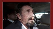 McAfee says US not questioning him