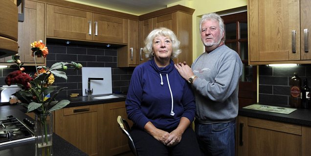 Devastated: Ann Reeve and Peter Gould in their kitchen, now refurbished