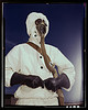 Sailor at the Naval Air Base wears the new type protective clothing and gas mask designed for use in chemical warfare, Corpus Christi, Texas. These uniforms are lighter than the old type (LOC) by The Library of Congress