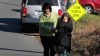PHOTO: A parent and child leave the scene of the Sandy Hook Elementary School following a shooting inside the school in Newtown, Connecticut, on December 14, 2012.