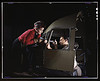 Riveting team working on the cockpit shell of a B-25 [i.e. C-47] bomber at the plant of North American Aviation, Inc., Inglewood [i.e. Douglas Aircraft Company, Long Beach], Calif.  (LOC) by The Library of Congress