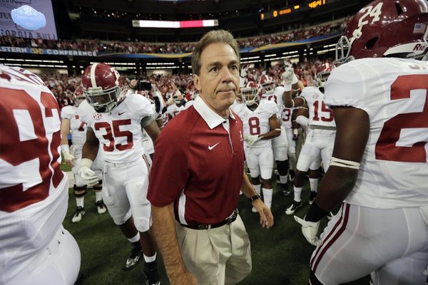 Nick Saban, above, and Ron Jaworski probably won't be having Christmas dinner together.