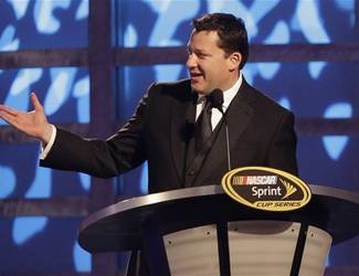 Tony Stewart speaks during the season-ending NASCAR awards ceremony while accepting the award for his 9th place finish in the NASCAR Sprint Cup Series Championship, Friday, Nov. 30, 2012, in Las Vegas. (AP Photo/Julie Jacobson)
