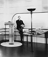 [Raymond Loewy in a mock-up of his office, ca. 1934]