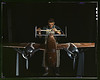 An experimental scale model of the B-25 plane is prepared for wind tunnel tests in the plant of North American Aviation, Inc., Inglewood, Calif. This plant produced the B-25 bomber (LOC) by The Library of Congress