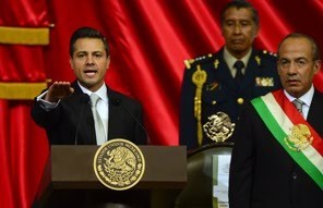 Mexican new President Enrique Pena Nieto takes the constitutional oath during his inauguration at the Congress in Mexico City, on December 1, 2012 as outgoing President Felipe Calderon (R) and the president of Mexican Congress Jesus Murillo (L) look on. Enrique Pena Nieto was sworn in as president of Mexico on Saturday following protests by leftist lawmakers inside the congress and clashes between demonstrators and police outside. AFP PHOTO/ALFREDO ESTRELLAALFREDO ESTRELLA/AFP/Getty Images