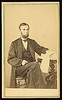 [Abraham Lincoln, U.S. President. Seated portrait, holding glasses and newspaper, Aug. 9, 1863] (LOC) by The Library of Congress