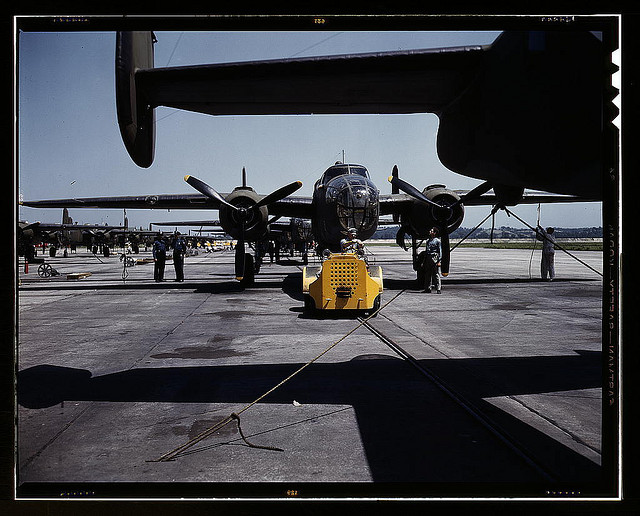 A fast, hard-hitting new A-20 [i.e., B-25] attack bomber is brought for a test hop to the flight line at the Long Beach, Calif., plant of Douglas Aircraft Company (LOC)