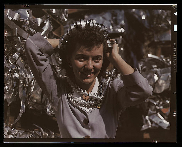 Annette del Sur public[iz]ing salvage campaign in yard of Douglas Aircraft Company, Long Beach, Calif. (LOC)