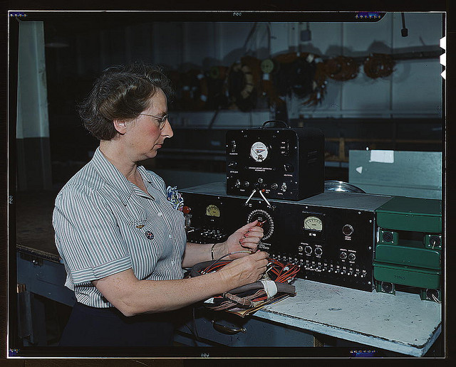 Working with the electric wiring at Douglas Aircraft Company, Long Beach, Calif. (LOC)