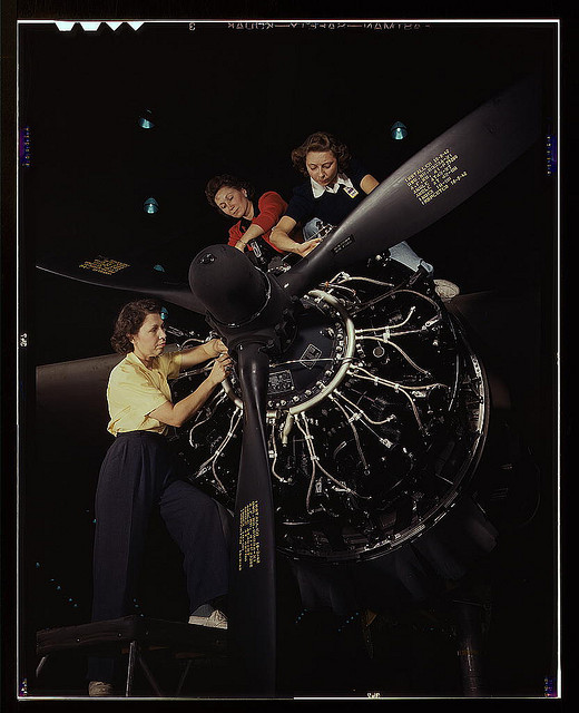 The careful hands of women are trained in precise aircraft engine installation duties at Douglas Aircraft Company, Long Beach, Calif. (LOC)