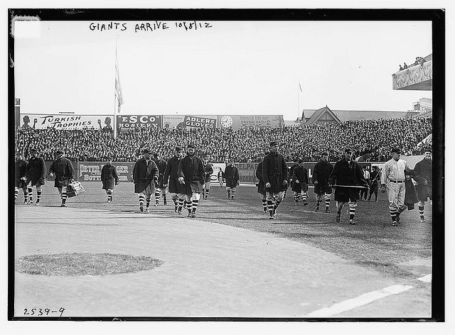 [New York Giants walk onto the field at the Polo Grounds [New York] prior to Game One of the 1912 World Series, October 8, 1912 (baseball)] (LOC)