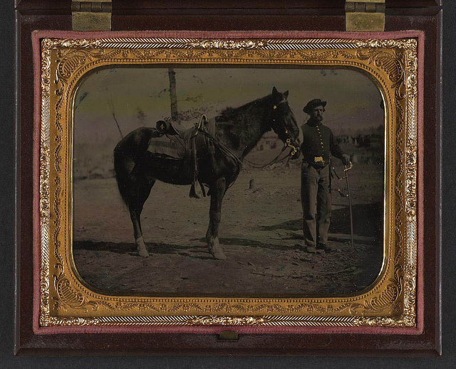 [Unidentified soldier in Union uniform with saber and horse] (LOC)