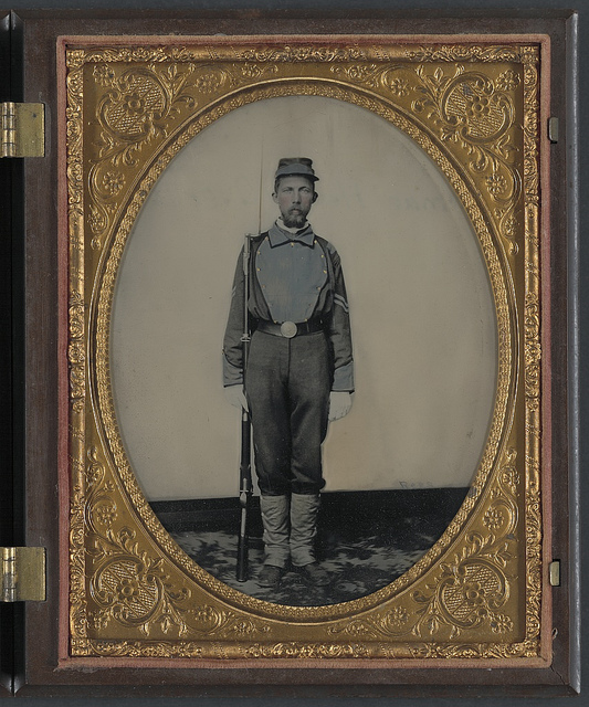 [Corporal Samuel H. Overton of A Company, 44th Virginia Infantry Regiment and A Company, 20th Battalion Virginia Heavy Artillery Regiment in uniform and kepi with bayoneted musket] (LOC)