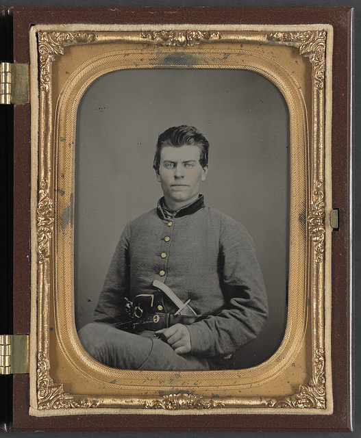 [Theophilus Mann of Company G, 1st (Farinholt's) Virginia Infantry Battalion Reserves, with pistol and knife] (LOC)