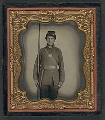 [Private James M. Bash of Company E, 67th Pennsylvania Volunteers in uniform with bayoneted musket] (LOC)