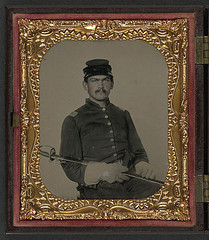 [Unidentified soldier in Union first lieutenant's uniform and gauntlets with field officer's sword] (LOC)
