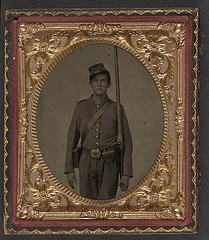 [Unidentified soldier in Union uniform with cartridge and cap boxes standing with musket] (LOC)