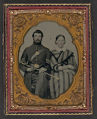 [Unidentified soldier in Union sergeant's uniform with Model 1840 non-commissioned officer's sword next to unidentified woman] (LOC)