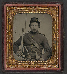 [Unidentified soldier in Union uniform with bayoneted musket, knife, and single-shot percussion pistol] (LOC)