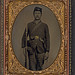 [Unidentified soldier in Union uniform with bayoneted musket, bayonet in scabbard, and cap box] (LOC)