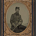[Unidentified soldier in Union first lieutenant's uniform with U.S. Model 1850 staff and field officer's sword] (LOC)