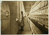 Rhodes Mfg. Co., Lincolnton, N.C. Spinner. A moments glimpse of the outer world Said she was 10 years old. Been working over a year.  Location: Lincolnton, North Carolina. (LOC) by The Library of Congress