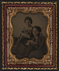 [Two unidentified women reading letters] (LOC)