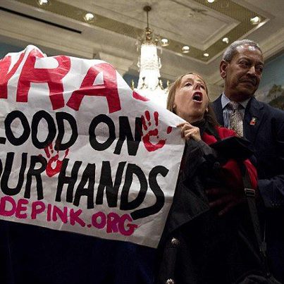 Photo: 'The only way to stop a bad guy with a gun is with a good guy with a gun': NRA CEO Wayne LaPierre's astonishing response to Sandy Hook shootings - as protestors storm their first press conference since tragedy...

Has the Sandy Hook massacre finally made America fall out of love with guns? http://bit.ly/U2b6iK

Or do you agree with the NRA statement that schools be given armed guards? http://bit.ly/UNyocZ