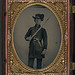 [Unidentified young soldier in Confederate uniform and Hardee hat with holstered revolver and artillery saber] (LOC)
