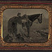 [John E. Cummins of the 50th, 99th, and 185th Ohio Infantry regiments in Union uniform next to a horse] (LOC)