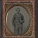 [Unidentified soldier in Confederate uniform with musket and D-guard Bowie knife] (LOC)