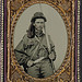 [Unidentified soldier in Confederate infantry uniform with musket and Bowie knife] (LOC)