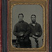 [Two unidentified soldiers, possibly father and son, in Union uniforms with 20th regiment insignias on their kepis] (LOC)
