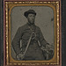 [Unidentified soldier in Confederate uniform and Virginia sword belt plate with revolver and cavalry sword] (LOC)