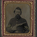 [Unidentified soldier in Union sergeant's uniform and U.S. belt buckle with Savage revolver] (LOC)