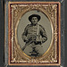 [Unidentified soldier in Confederate frock coat and slouch hat with Bowie knife and Colt Army Model 1860 revolver] (LOC)
