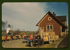 Trucks outside of a starch factory, Caribou, Aroostook County, Me. There were almost fifty trucks in the line. Some had been waiting for twenty-four hours for the potatoes to be graded and weighed (LOC)
