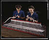 Two women workers are shown capping and inspecting tubing which goes into the manufacture of the "Vengeance" (A-31) dive bomber made at Vultee's Nashville division, Tennessee. The "Vengeance" (A-31) was originally designed for the French. It was later ado by The Library of Congress