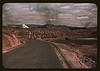 A train bringing copper ore out of the mine, Ducktown, Tenn. Fumes from smelting copper for sulfuric acid have destroyed all vegetation and eroded the land (LOC) by The Library of Congress