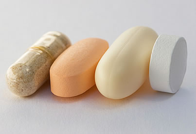 assorted supplement pills