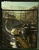 Carr Fork Canyon as seen from "G" bridge, Bingham Copper Mine, Utah. In the background can be seen a train with waste or over-burden material on its way to the dump (LOC) by The Library of Congress