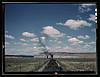 A freight train stopping for coal and water at a siding enroute to Gallup, New Mexico, near Laguna, N.M. (LOC) by The Library of Congress