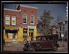 [Shulman's Market at the southeast corner of N Street and Union Street S.W., Washington, D.C., with a 1931 Chevrolet car parked in front] (LOC) by The Library of Congress