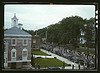 An American town and its way of life, Southington, Conn. The Memorial Day parade moving down the main street. The small number of spectators is accounted for by the fact that the town's war factories did not close. The town hall is in the left foreground. by The Library of Congress