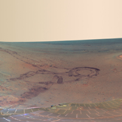 This full-circle scene combines 817 images, taken by the panoramic camera on NASA's Mars Exploration Rover Opportunity, showing the terrain that surrounded the rover while it was stationary for four months of work during its most recent Martian winter.