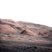 A chapter of the layered geological history of Mars is laid bare in this postcard from NASA's Curiosity rover. The image shows the base of Mount Sharp, the rover's eventual science destination.