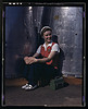 A noontime rest for a full-fledged assembly worker at the Long Beach, Calif., plant of Douglas Aircraft Company. Nacelle parts for a heavy bomber form the background (LOC) by The Library of Congress