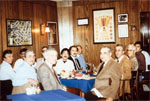 Several people at a table in a restaurant