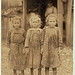 Josie, six year old, Bertha, six years old, Sophie, 10 years old, all shuck regularly. Maggioni Canning Co.  Location: Port Royal, South Carolina. (LOC)